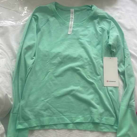 lululemon athletica Tops - Lululemon Swiftly Tech Long Sleeve Shirt
Race Length | Kelley Green NEW!!